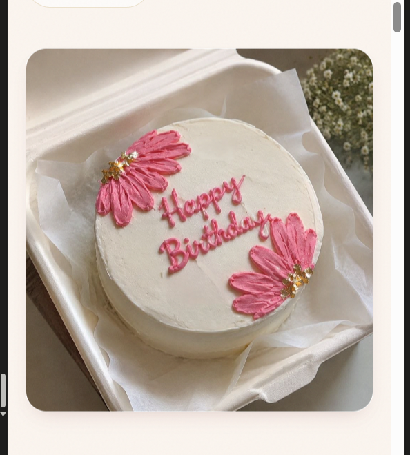 White bento birthday cake with hand-piped pink daisy petals, gold centres and script Happy Birthday — Sweet Bloom Bakery, Asansol